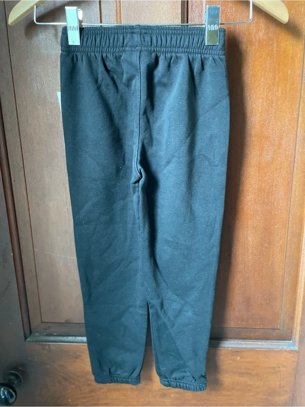Under Armour boys size 6 black sweatpants